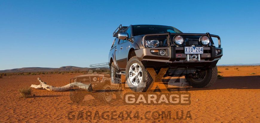 Передній амортизатор-стійка OME Nitrocharger Sport Mitsubishi L200 2006-2015 90008 фото