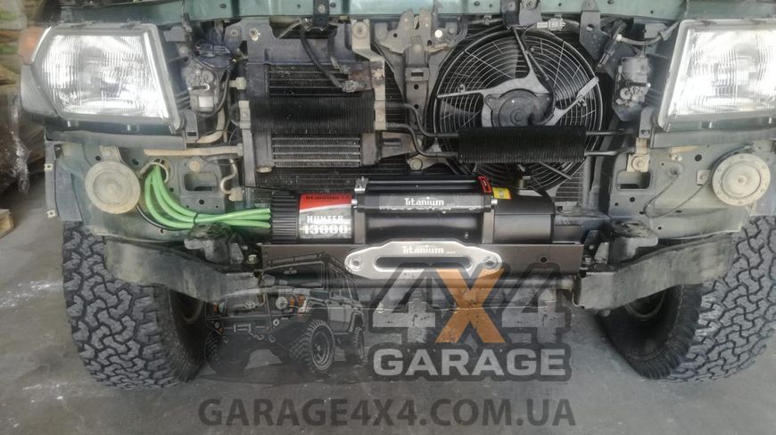 Автомобильная лебедка Titanium Hunter 13000 (синтетический трос / 5900 кг) 03605s фото