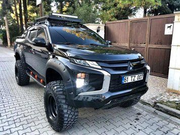 Пластикові рознирювачі арок (фендера) Mitsubishi L200 2019+ FF-MT19B фото