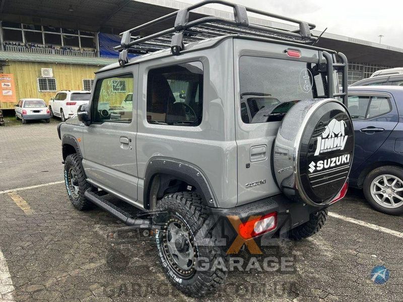 Пластикові розширювачі арок (фендера) Suzuki Jimny 2018+ (ABS-пластик / на скотчі 3М) FF-JN18B фото
