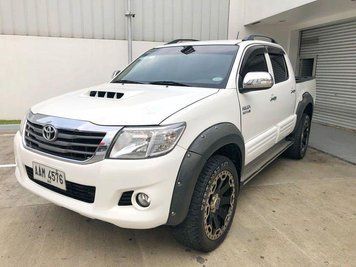 Пластикові розширювачі арок Toyota Hilux 2012-2015 (Фендера / ABS-пластик) FF-V4D12B фото