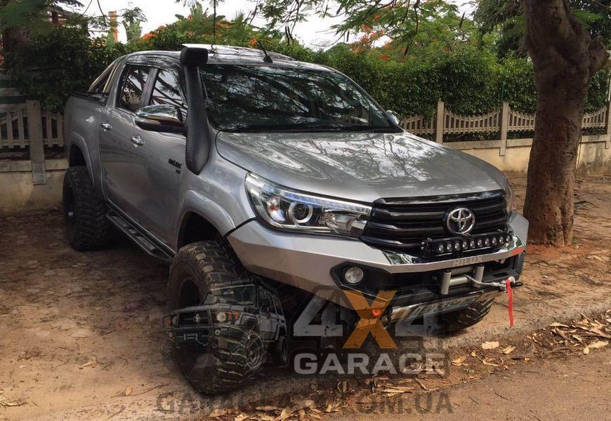 Передний амортизатор-стойка OME Nitrocharger Sport 90028 для Toyota Hilux 2015 - н.в. 90028 фото