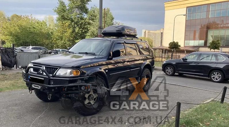 Механические хабы Amisа для Mitsubishi Pajero Sport (муфты свободного хода) M-28 фото