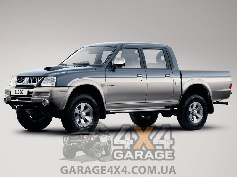 Комплект подвески Old Man Emu Mitsubishi L200 1996-2006 303006, 60040 (2шт), CS023R, 60050 (2шт), OMEU57, OMEGS16 фото